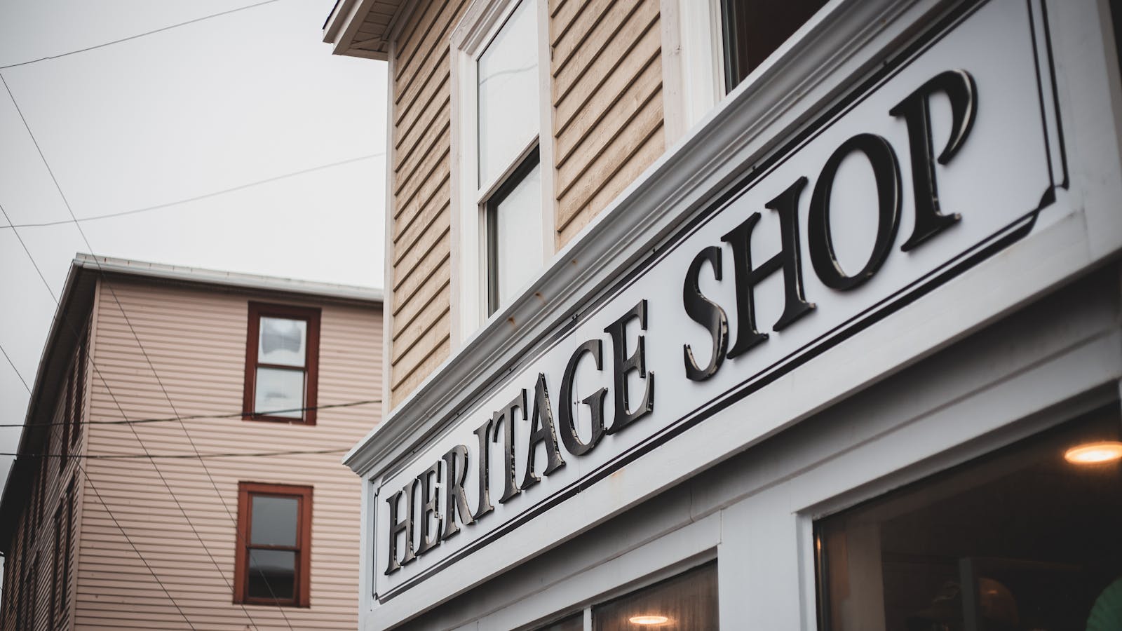 Gold-leaf storefront window lettering
